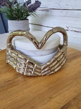 Metal Skeleton Hand Heart Shape Holding Set of 4 White Marble Coasters